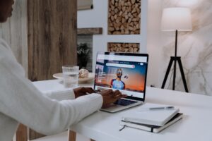 Woman browsing airbnb on laptop